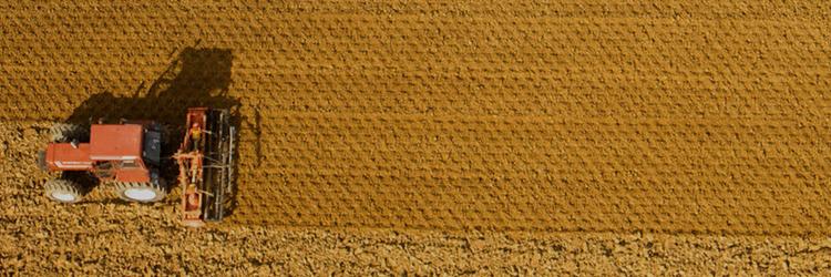 Tractor on the field, Purina Sourcing Hero Banner 
